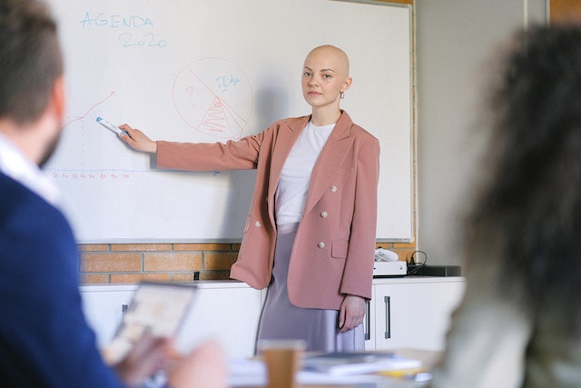 person using a whiteboard