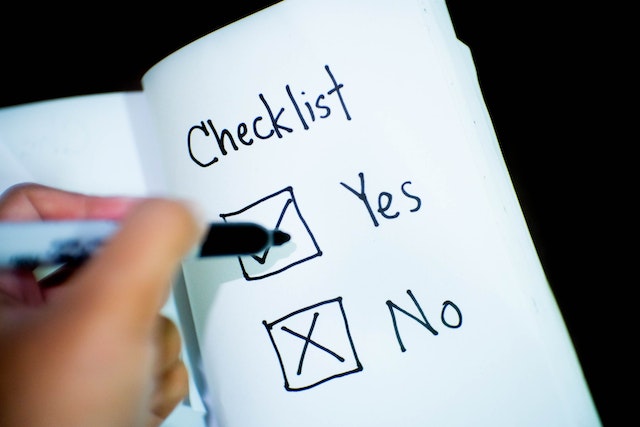 open notebook page that says "Checklist: Yes No"